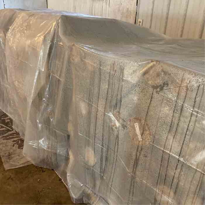 plastic sheeting covering logs plastic sheeting covering logs
